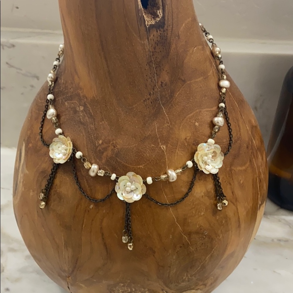 Handmade vintage flower necklace.